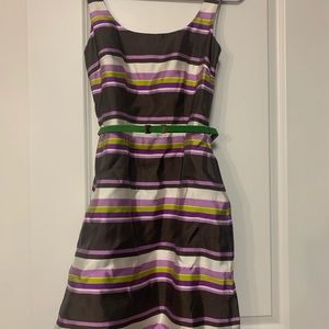 Purple, white, brown, and green Kate Spade dress with green belt.